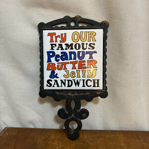 1970's Taiwan Wall Tile Trivet Cast Iron "Try Our Famous Peanut‎ Butter Jelly”